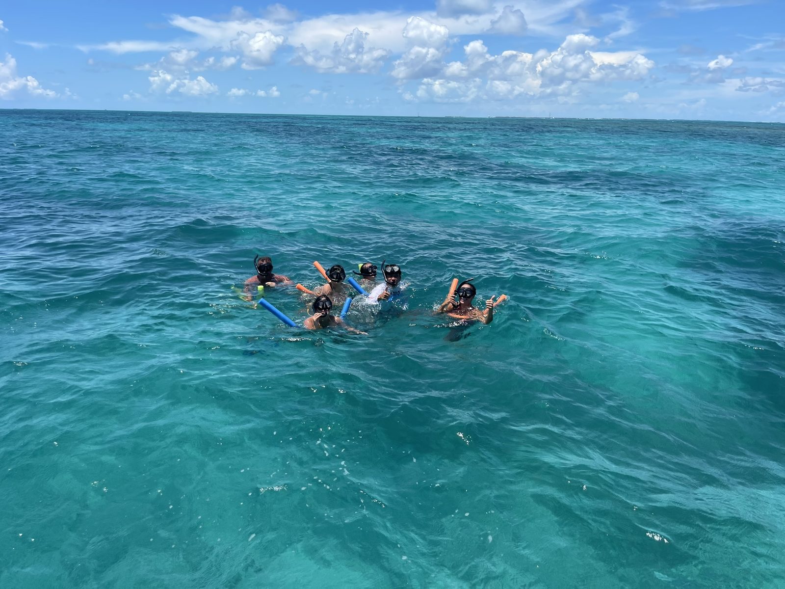 Private snorkeling charter in Key West with guests enjoying clear blue water
